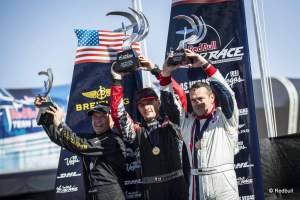 Nigel Lamb of Great Britain (L), Pete McLeod of Canada (C) and Matthias Dolderer (R) celebrate during the Award Ceremony on the seventh stage of the Red Bull Air Race World Championship at the Las Vegas Motor Speedway in Las Vegas, Nevada, United States on October 12, 2014. // Christian Pondella/Red Bull Content Pool