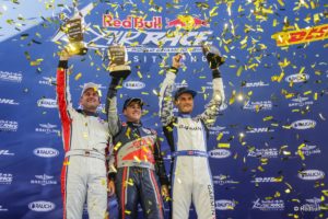 Matt Hall of Australia (C) celebrates with Matthias Dolderer of Germany (L) and Pete McLeod of Canada (R) during the Award Ceremony at the sixth stage of the Red Bull Air Race World Championship at Eurospeedway in Lausitz, Germany on September 4, 2016.