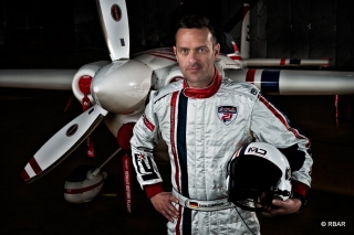 Matthias Dolderer of Germany poses for a photograph during the Red Bull Air Race World Series in Abu Dhabi, United Arab Emirates on February 23, 2014.