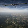 20120724_crossingsfrontiers_returntopayerne_puydedome_BP_revillard L'avion solar impulse en route pour payerne survole le puy de dome et la ville de clermont ferrand