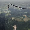 20120724_crossingsfrontiers_returntopayerne_puydedome_BP_revillard L'avion solar impulse en route pour payerne survole le puy de dome et la ville de clermont ferrand