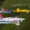 Nigel Lamb and Paul Bohomme of Great Britain give Peter Besenyei of Hungary an aerial view of their home country ahead of the weekend\'s Red Bull Air Race World Championship stop in Ascot over the Uffington White Hores in the Oxfordshire countryside near Oxford in the United Kingdom on August 11, 2015.