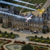 Nigel Lamb and Paul Bohomme of Great Britain give Peter Besenyei of Hungary an aerial view of their home country ahead of the weekend\'s Red Bull Air Race World Championship stop in Ascot over the Waddesdon Manor in the heart of the Buckinghamshire countryside near Oxford in the United Kingdom on August 11, 2015.
