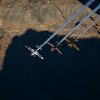 Paul Bonhomme of Great Britain, Peter Besenyei of Hungary and Matt Hall of Australia fly over the Grand Canyon prior to the eight and final stage of the Red Bull Air Race World Championship in Arizona, United States on October 14, 2015.