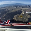 Paul Bonhomme of Great Britain, Peter Besenyei of Hungary and Matt Hall of Australia fly over the Grand Canyon prior to the eight and final stage of the Red Bull Air Race World Championship in Arizona, United States on October 14, 2015.