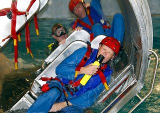 PERTH, AUSTRALIA - APRIL 12: Red Bull Air Race Pilots participate in underwater crash survival training at ERGT training facilities on April 12, 2010 in Perth, Australia.