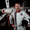 Matthias Dolderer of Germany poses for a photograph during the Red Bull Air Race World Series in Abu Dhabi, United Arab Emirates on February 23, 2014.
