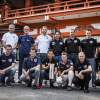 The pilots pose for a photograph in front of Chiba Shrine prior to the second stage of the Red Bull Air Race World Championship in Chiba, Japan on May 14, 2015.