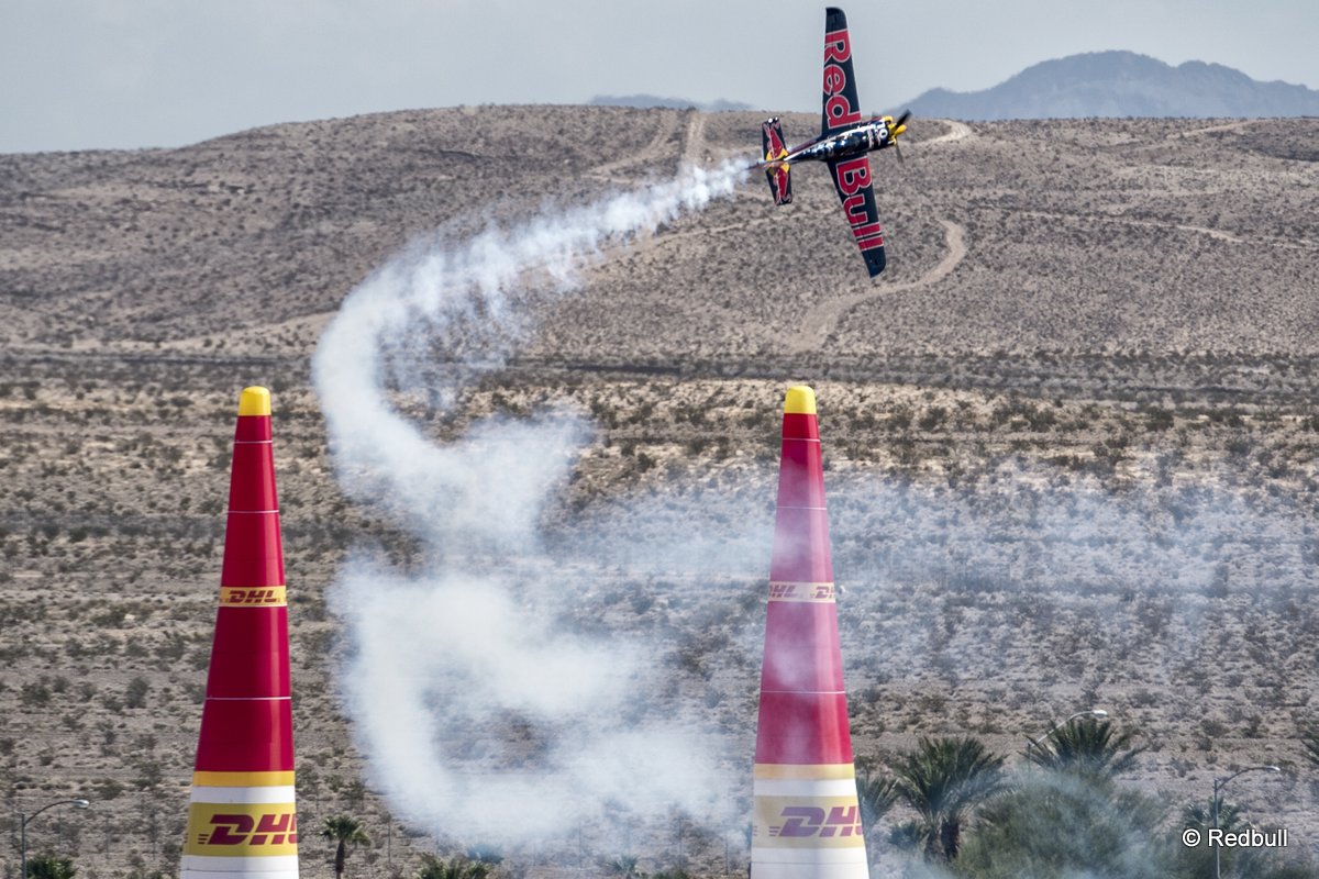 Kirby Chambliss of the United States performs during the training session for the seventh stage of the Red Bull Air Race World Championship at the Las Vegas Motor Speedway in Las Vegas, Nevada, United States on October 10, 2014. Kirby Chambliss of the United States performs during the training session for the seventh stage of the Red Bull Air Race World Championship at the Las Vegas Motor Speedway in Las Vegas, Nevada, United States on October 10, 2014.