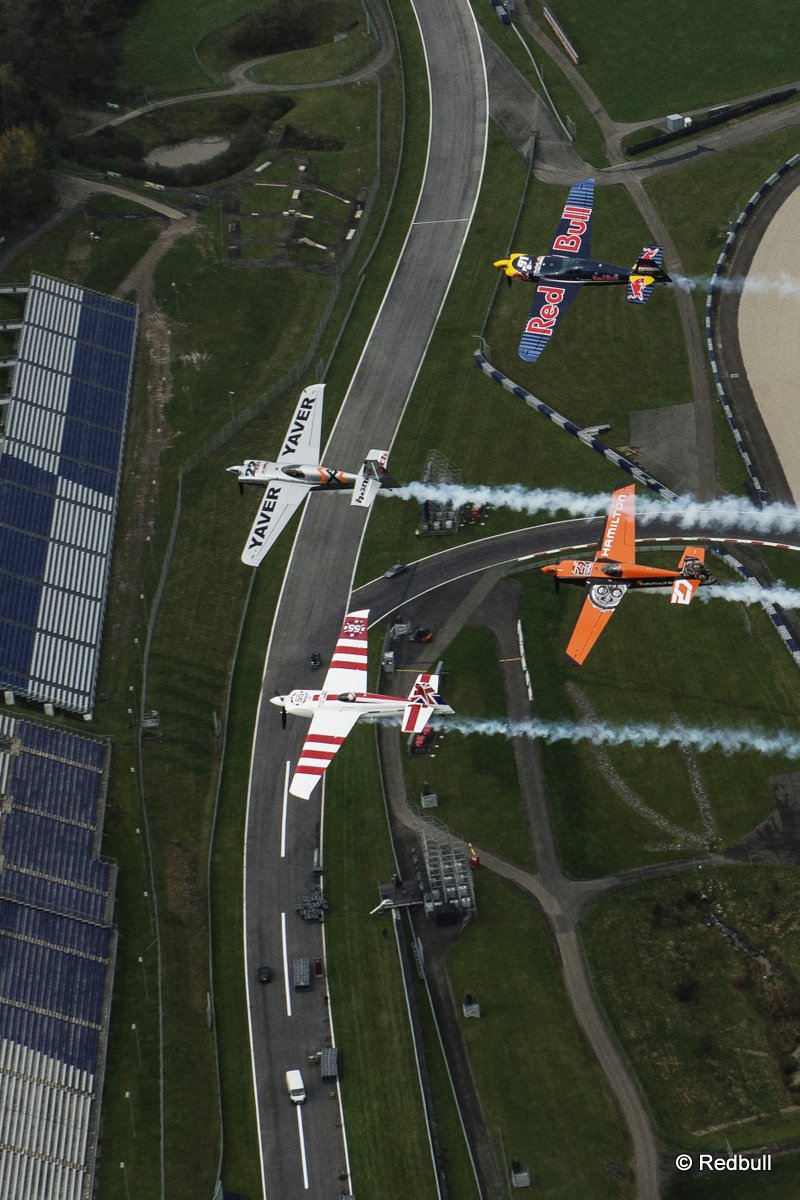 Hannes Arch of Austria flies in formation with Paul Bonhomme of Great Britain, Peter Besenyei of Hungary and Nicolas Ivanoff of France during a Recon flight prior to the eight stage of the Red Bull Air Race World Championship over the Red Bull Ring in Spielberg, Austria on October 22, 2014.