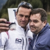 TV Moderator Alexander Duszat alias Elton of Germany poses for a photograph with Matthias Dolderer during the training for the eighth stage of the Red Bull Air Race World Championship at the Red Bull Ring in Spielberg, Austria on October 24, 2014.