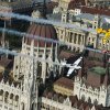 Peter Besenyei of Hungary leads Francois Le Vot of France and Martin Sonka of the Czech Republic during the Recon flight over the Parliament Building prior to the Red Bull Air Race World Championship in Budapest, Hungary on July 02, 2015.