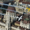Peter Besenyei of Hungary leads Francois Le Vot of France and Martin Sonka of the Czech Republic during the Recon flight over the Parliament Building prior to the Red Bull Air Race World Championship in Budapest, Hungary on July 02, 2015.