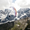Competitor flies at the Red Bull X-Alps 2013 at Ortler in Sulden, Italy on July 10th, 2013