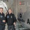 Payerne, Switzerland: (From left to right) André Borschberg, Co-founder and CEO and Bertrand Piccard, Initiator and Chairman are standing beside the cockpit of Solar Impulse 2, the single seater solar airplane with which they will attempt in 2015 the first round-the-world solar flight.